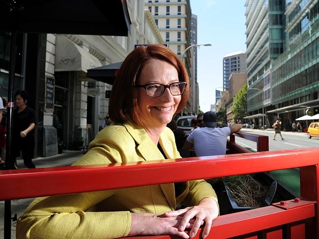 Julia Gillard can use the knife in her back to cut her birthday cake.