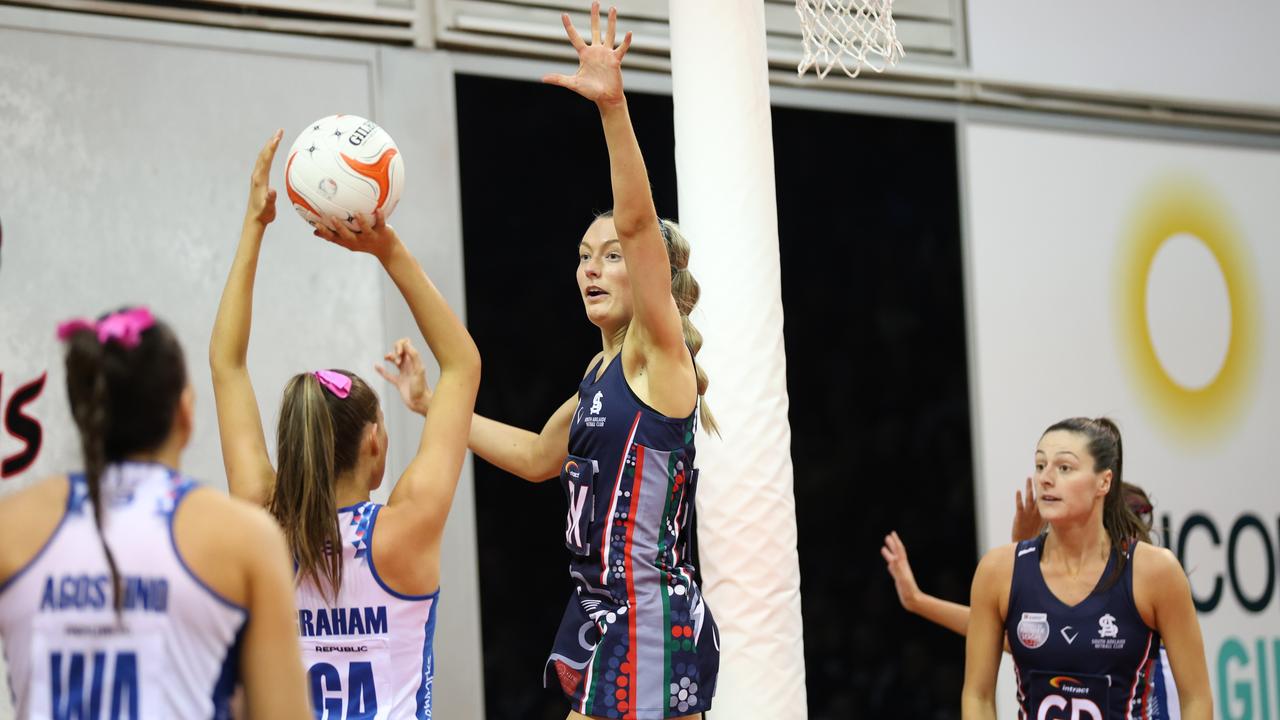 South Adelaide's Ashleigh Gray defends against Kayla Graham. Picture: Christopher Adams/Netball SA