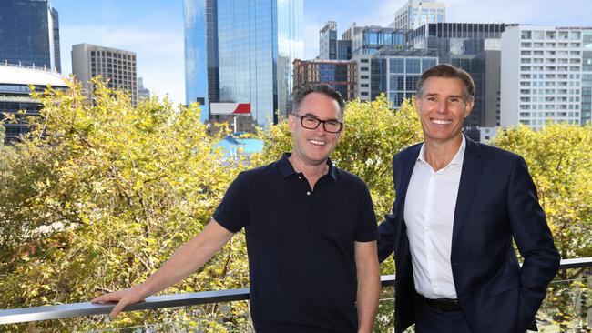 McGrath founder John McGrath with former CEO Geoff Lucas.