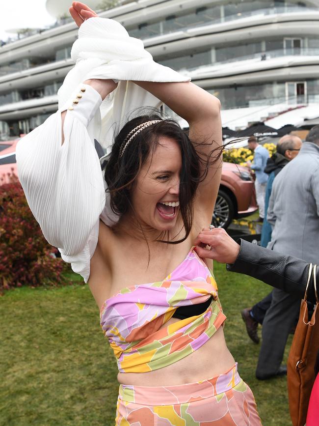 Wild scenes at Flemington.