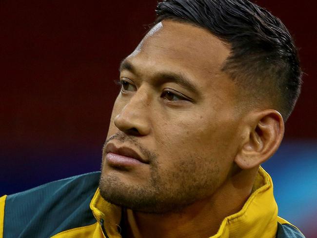 (FILES) In this file photo taken on November 9, 2018 Australia's wing Israel Folau attends the captain's run training session at the Principality stadium in Cardiff, south Wales on November 9, 2018, on the eve of their autumn international rugby union match against Wales. - Wallabies star Israel Folau was on May 17, 2019 sacked for an anti-gay statement on social media, signalling an end to his glittering career in Australia. (Photo by GEOFF CADDICK / AFP) / RESTRICTED TO EDITORIAL USE -use in books subject to Welsh Rugby Union (WRU) approval