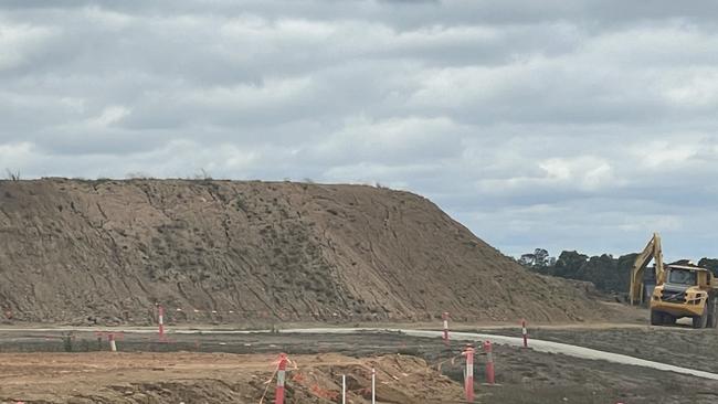 Pakenham locals have been engulfed by dust, coming from the Honora Estate developments on Ryan Rd. Massive dust piles upwards of 40m high have been dumped as close as 100m to residential homes. Picture: Gemma Scerri