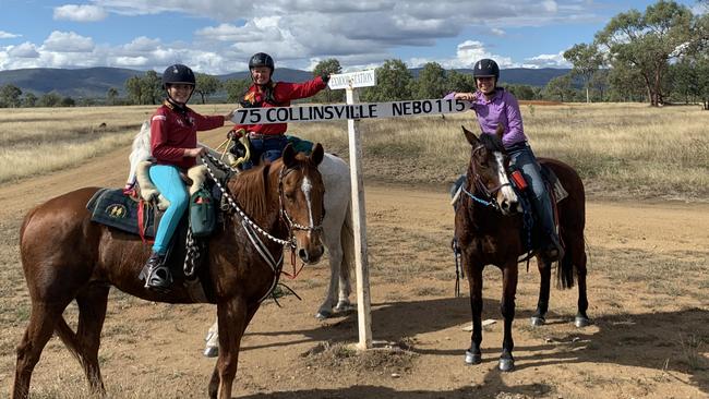 Taya (left) and Atari Brand (right) ride along the National Trail with Grandmother Sandy Cowan (centre). Picture: Contributed