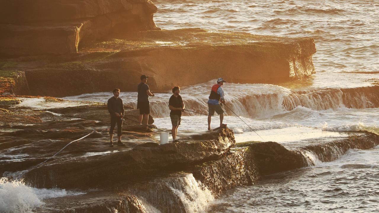 Anglers are commonly seen on the rocky platforms around Little Bay. Picture: John Grainger.