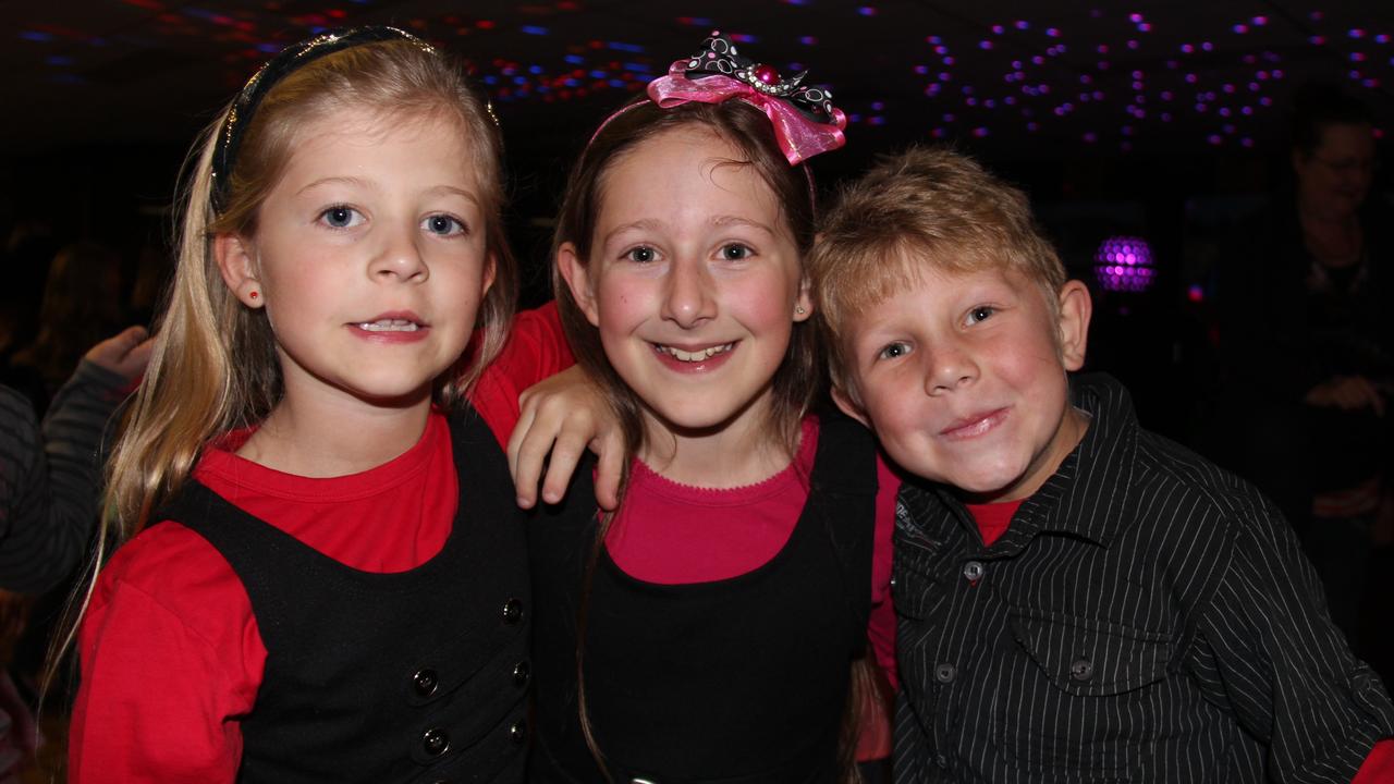 Mia Lingard, Lilly Lingard and Nicholas Mandavy caught up at the Blue Light Disco on Friday night Photo Erin Smith / Stanthorpe Border Post