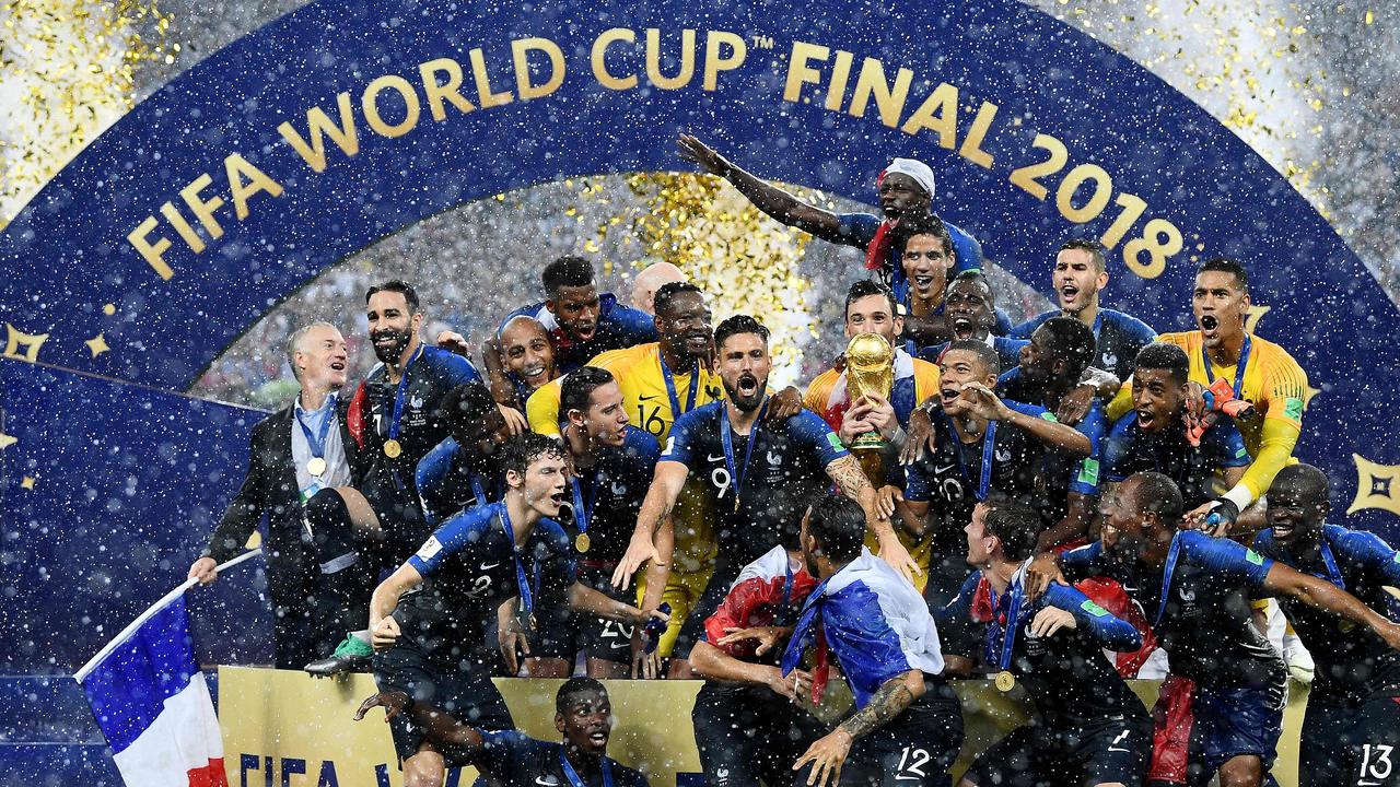 Pure ecstasy! France players celebrate with the trophy after defeating Croatia in the World Cup final.
