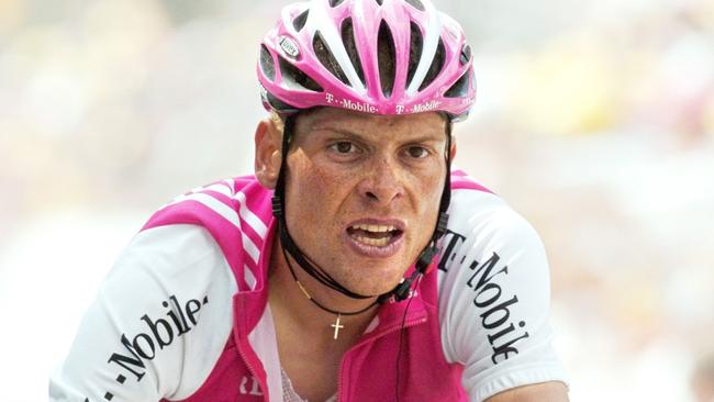 WIRE: ** FILE **  T-Mobile team leader Jan Ullrich of Germany crosses the finish line of the 15th stage of the Tour de France cycling race, between Valreas, southern France, and Villard-de-Lans, French Alps, in this July 20, 2004 file picture.  T-Mobile cycling team says Friday, June 30, 2006, it has suspended top rider Jan Ullrich amid alleged doping scandal and says he will not ride in Tour de France. (AP Photo/Christophe Ena)