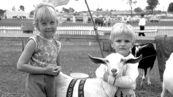 Children with a goat at the Gold Coast Show in the 1960s. Picture: Bob Avery