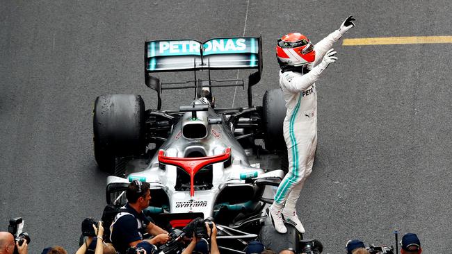 Lewis Hamilton celebrates in parc ferme during the F1 Grand Prix of Monaco at Circuit de Monaco on May 26.