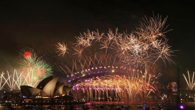 New Year's Eve midnight fireworks over Sydney Harbour as seen from Mrs Macquarie's Chair. Picture: Jonathan Ng