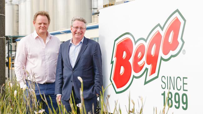 Bega chief Paul van Heerwaarden chairman and Barry Irvin at the new Bega signage. Picture: Chloe Smith.