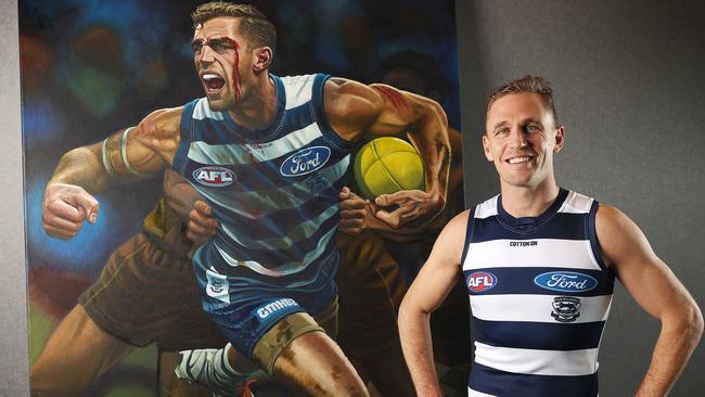 Joel Selwood with a Jamie Cooper painting of himself. Picture: Michael Klein