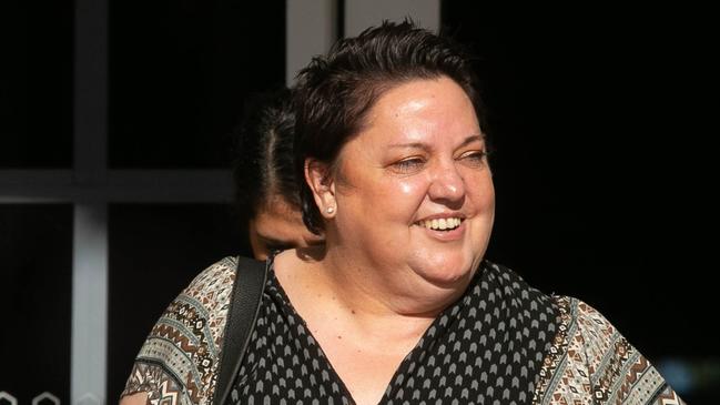 Witness Tracey Walsh leaves the royal commission. Picture: AAP