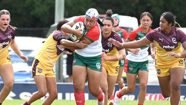 Sky-yvette Faimalie charging in the Under 17 City v Country Girls rugby league. Saturday 13, 2024. Picture, John Gass