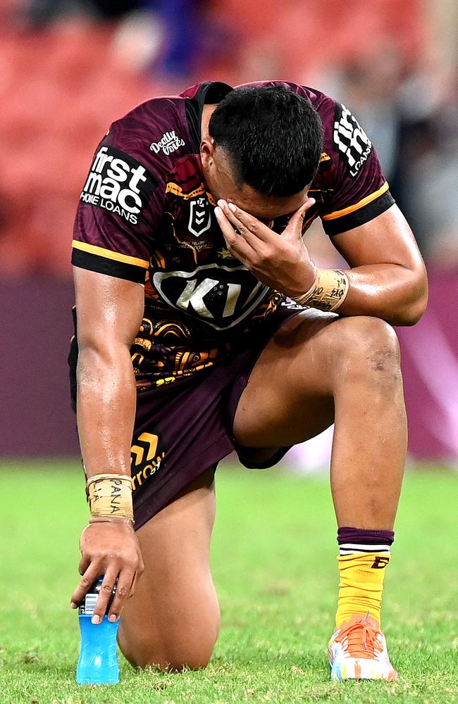 TC Robati of the Broncos looks dejected after his team loses the round 12 NRL match between the Brisbane Broncos and the Melbourne Storm at Suncorp Stadium, on May 27, 2021. Photo by Bradley Kanaris/Getty Images