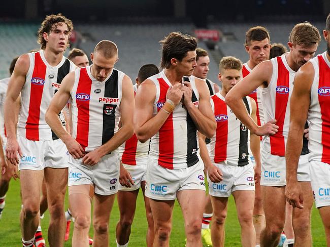 The Saints leave the field after losing the Round 3 AFL match between the Collingwood Magpies and the St Kilda Saints at the MCG in Melbourne, Saturday, June 20, 2020. (AAP Image/Scott Barbour) NO ARCHIVING, EDITORIAL USE ONLY