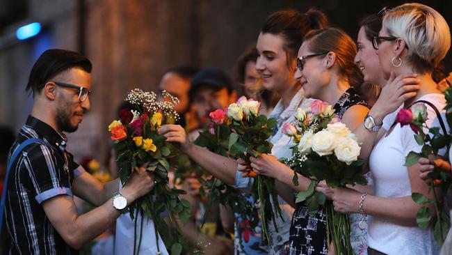 Islamophobic? Women give flowers to a member of the Muslim community. Picture: Dan Kitwood/Getty Images