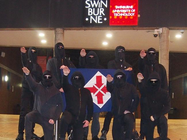 The National Socialist Network performing Hitler salutes at Swinburne University in Melbourne. Picture: Supplied