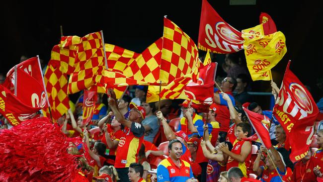 Suns fans during the round one AFL match between the Gold Coast Suns and the Brisbane Lions at Metricon Stadium on March 25, 2017 in Gold Coast, Australia. (Photo by Jason O'Brien/Getty Images)