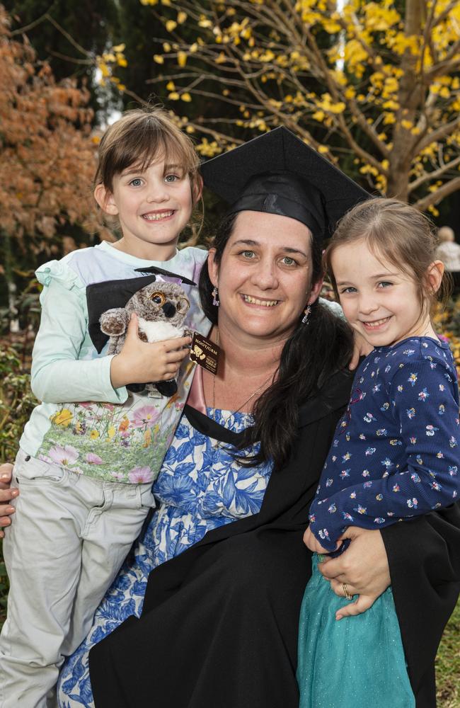 Bachelor of Education (Secondary) graduate Cheyanne Hall with daughters Bonnie (left) and Ivy Hall at a UniSQ graduation ceremony at The Empire, Tuesday, June 25, 2024. Picture: Kevin Farmer