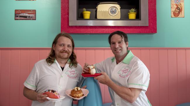 Michael Rowe and Marcus Sampson at the launch of Happy Days Donuts in Croydon in late 2018. Picture: Andy Brownbill