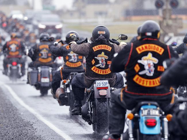 SUNDAY TELEGRAPH -  18/11/22  MUST CHECK WITH PIC EDITOR JEFF DARMANIN BEFORE USING -Outlaw motorcycle gang ÃThe BandidosÃ hold their national gathering for 2022 in Ballarat. Members ride through the rain on their way up the freeway to a cemetery.  Picture: Sam Ruttyn