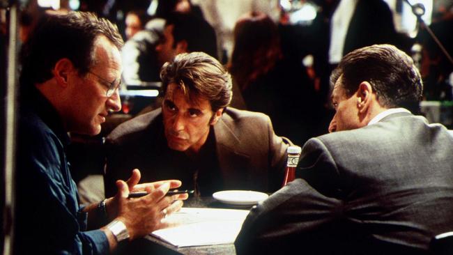 Director Michael Mann (left) with Al Pacino and Robert De Niro during filming of <i>Heat</i>.