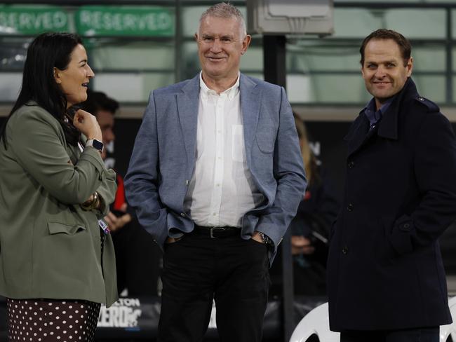 Laura Kane, Geoff Walsh and Josh Mahoney at the MCG this year. Picture: Michael Klein