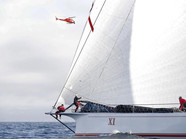 Wild Oats XI skippered by Mark Richards sails up the River Derwent on her way to a 9th line honours victory in the 2018 Sydney to Hobart Yacht Race. The yacht crossed the line in 1d 19hrs 7mins 21secs  . Picture: RICHARD JUPE