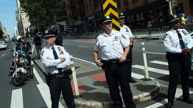 New York City police watch Joe Biden’s motorcade. Picture: AFP