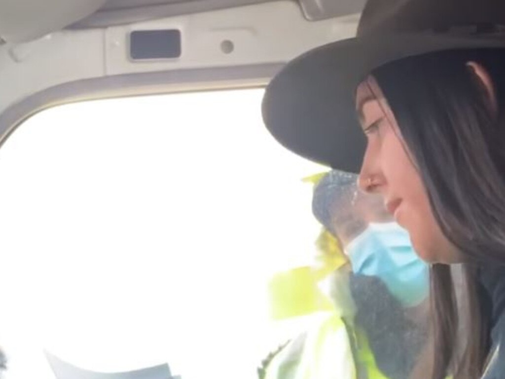 Coronavirus conspiracy theorist Eve Black drives through a checkpoint crossing in Melbourne last year. Picture: Facebook
