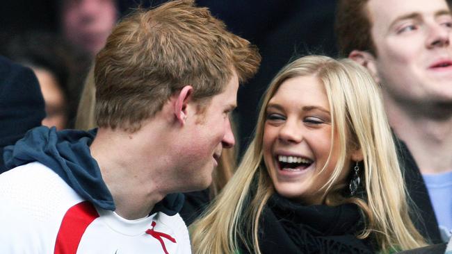 All smiles ... Prince Harry and then-girlfriend Chelsy Davy laughing before the start of the England v South Africa Investec Challenge International Rugby Match in Twickenham in 2008.