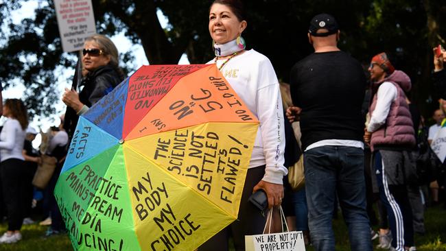 This protester tried to make a brolly good point. Picture: AAP