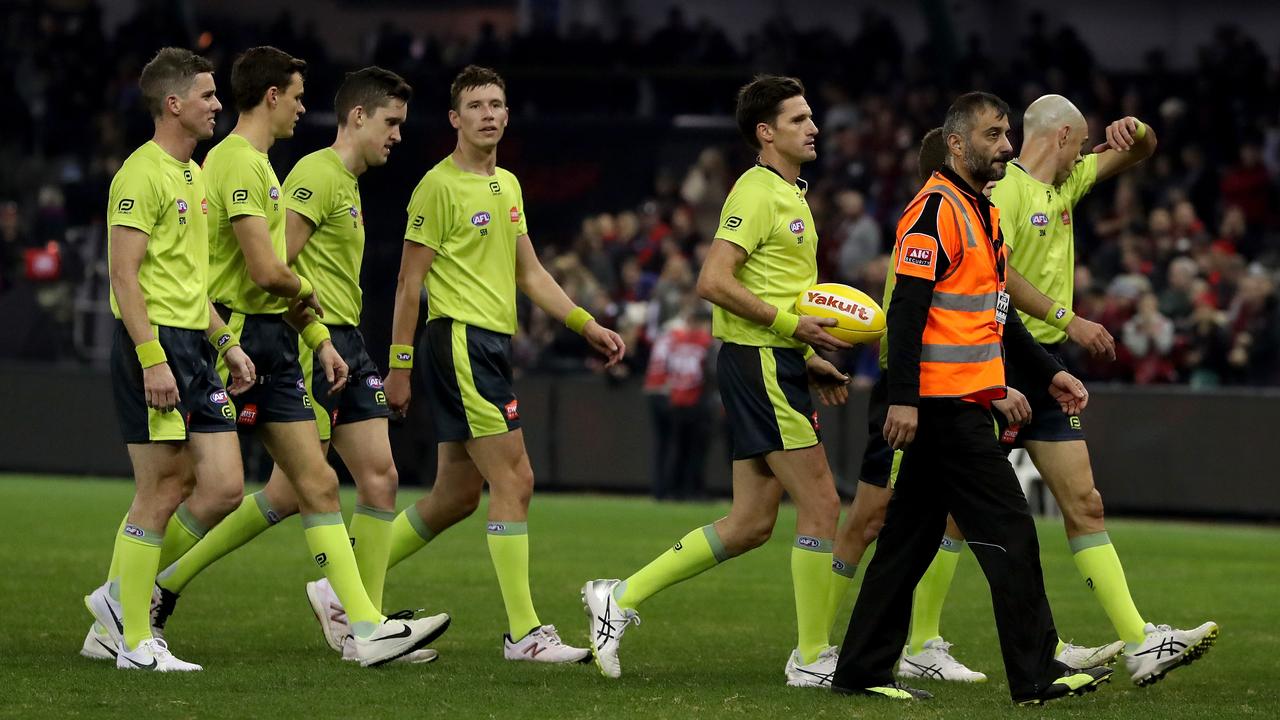 The AFL will trial an umpire interchange system during the bye rounds. (AAP Image/Mark Dadswell)