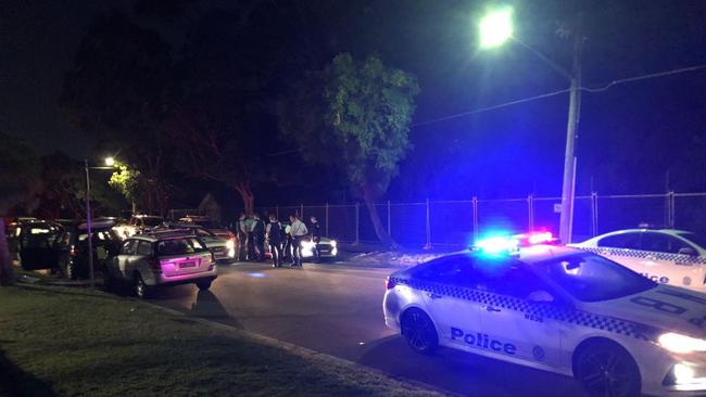 Police outside Balgowlah Heights Public School on Friday night, where a Tony Abbott supporter was attacked while putting up a campaign poster. Picture: Supplied