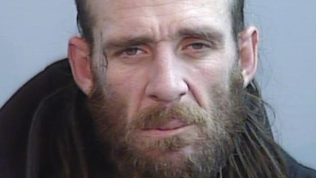 Kevin Smith, 37, is wanted by virtue of an outstanding arrest warrant for murder. Picture: NSW Police.