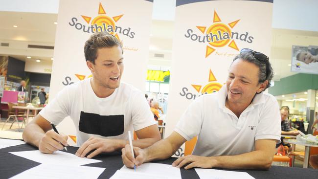 Penrith Panther Matt Moylan signs his contract. (Phil Rogers)