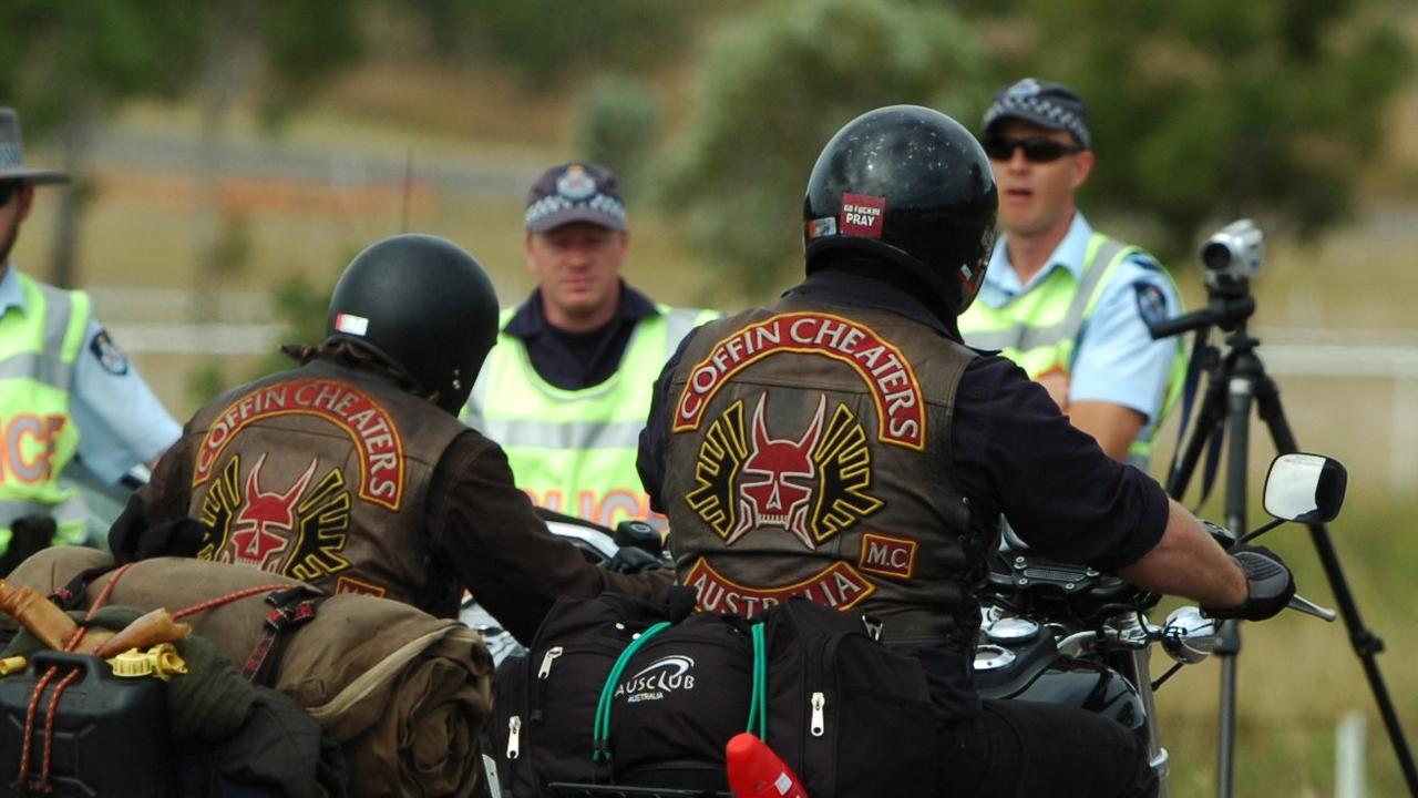 Coffin Cheaters bikie charged with extortion, assault after