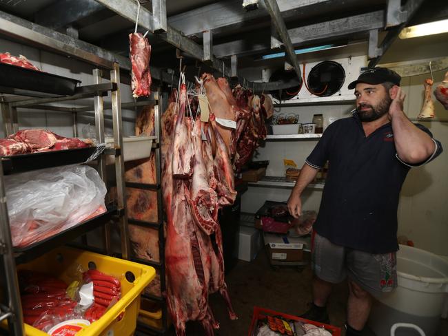 Butcher Josh Orr contemplates his freezer-load of bad meat. Picture: Gary Ramage