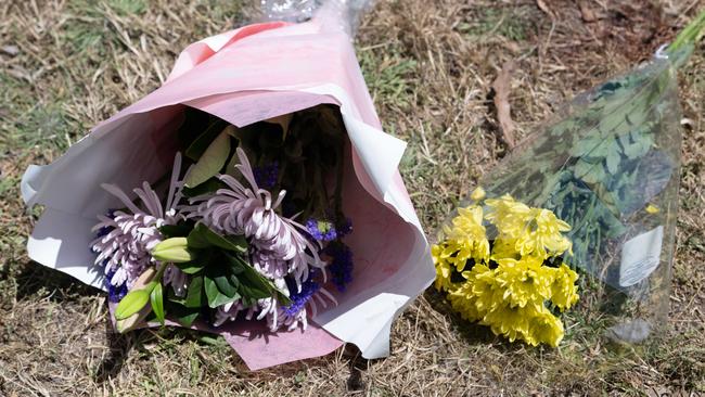 People have begun leaving flower tributes the scene of the crash on Beach Road, Goolwa. Picture: Morgan Sette