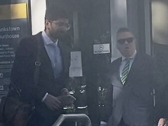 Paul Amwarenko (right) leaving Bankstown Local Court on Thursday with lawyer Dev Buhtani. Picture: Lauren Ferri