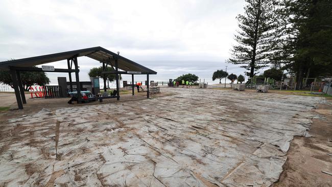 A succession of surf events, most recently the World Surf League, have destroyed picnic hub Burleigh Hill, leaving the Gold Coast's beauty spot a stinking mud pit. Pic Annette Dew