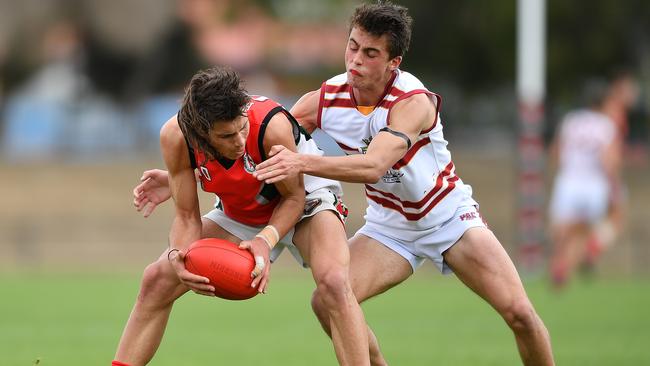 Caleb Poulter, of Henley High, holds off Oscar Clark, of PAC. Picture: Mark Brake