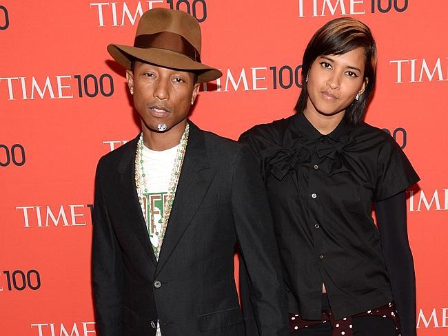 Influential ... Pharrell Williams, left, and Helen Lasichanh arrive at 2014 TIME 100 Gala in April.