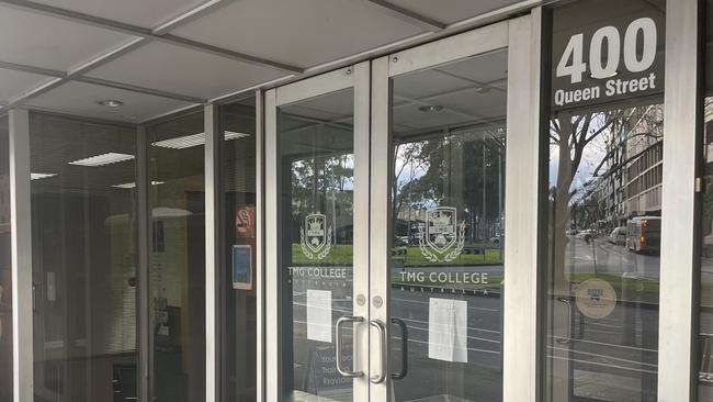 Notices at TMG College, Queen St in Melbourne, advising that training had been suspended.