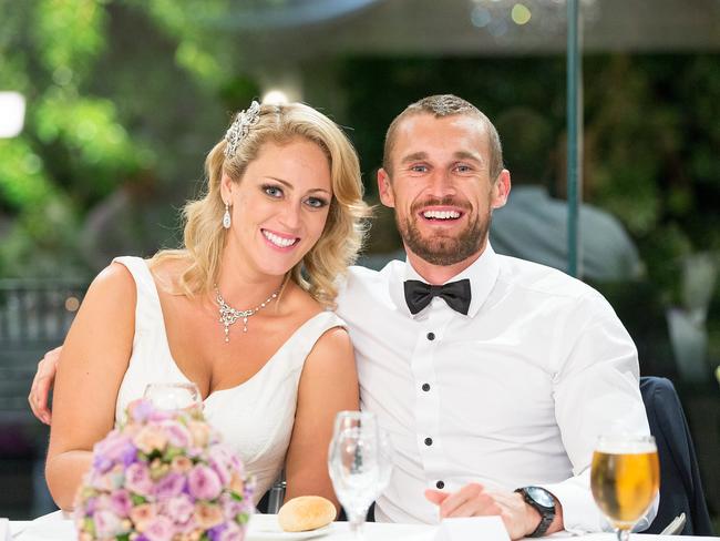 Complete strangers/newlyweds Clare and Jono on their wedding day.