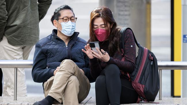 Melburnians wearing masks in Melbourne’s CBD as a precaution. Picture: NCA NewsWire / David Geraghty