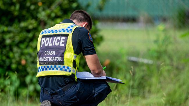 Major Crash Investigation officers at the scene where a Honda ATV buggy crashed on Bees Creek Rd this morning. Picture: Che Chorley