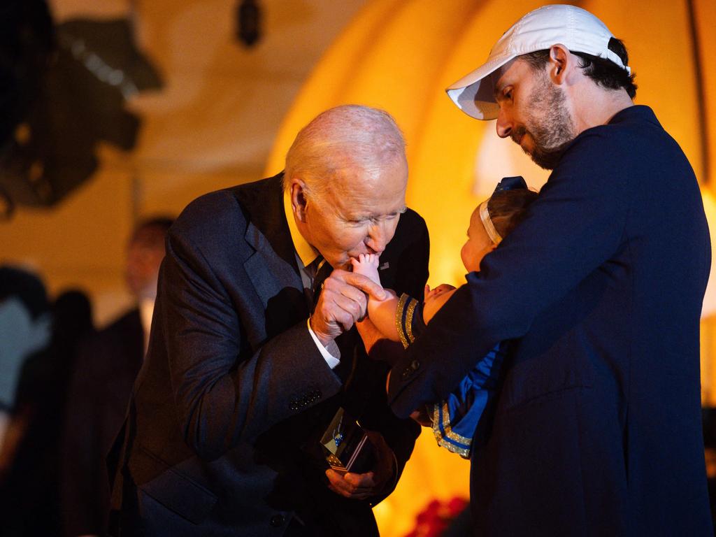 During the Halloween fun, Biden also bit a baby’s arm and another infant’s foot in jest while kissing a handful of other little ones who were carried by their parents.