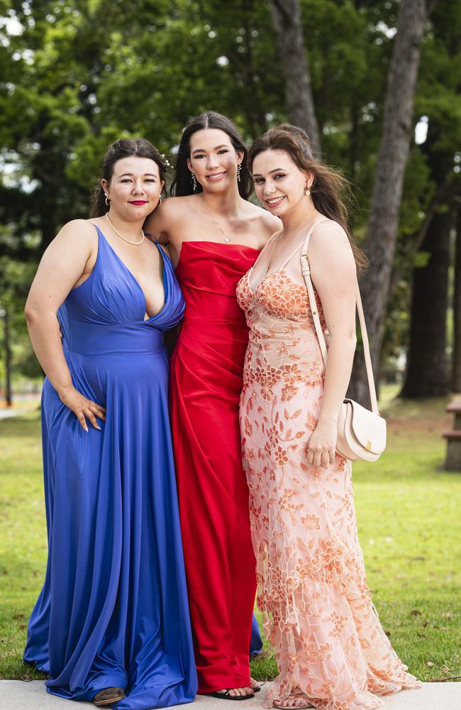 Graduates (from left) Maricka Murphy, Gemma Osmond and Amarina Allen as Downlands College year 12 students come together for their valedictory mass at the college, Saturday, November 16, 2024. Picture: Kevin Farmer